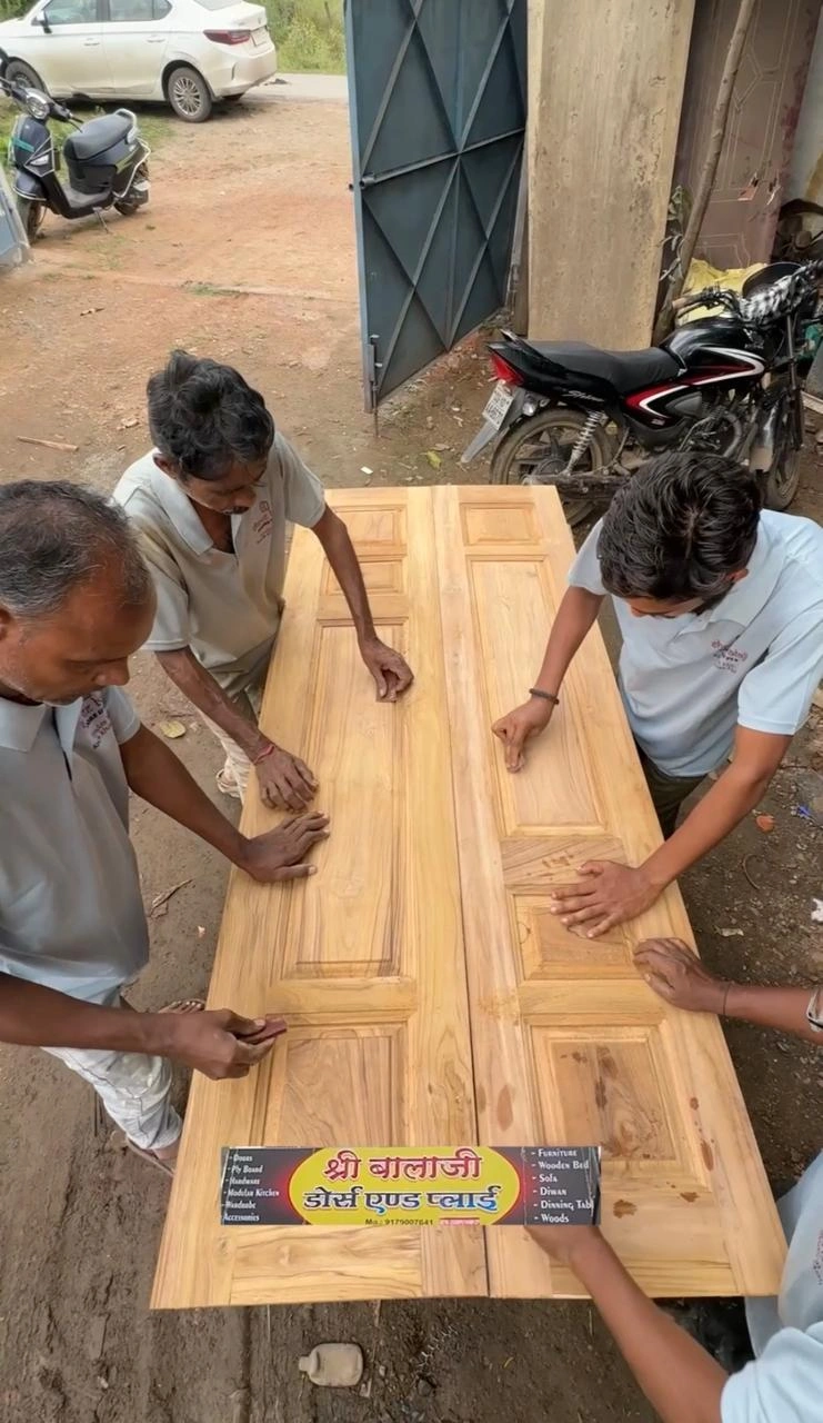 Worker Finishing Door